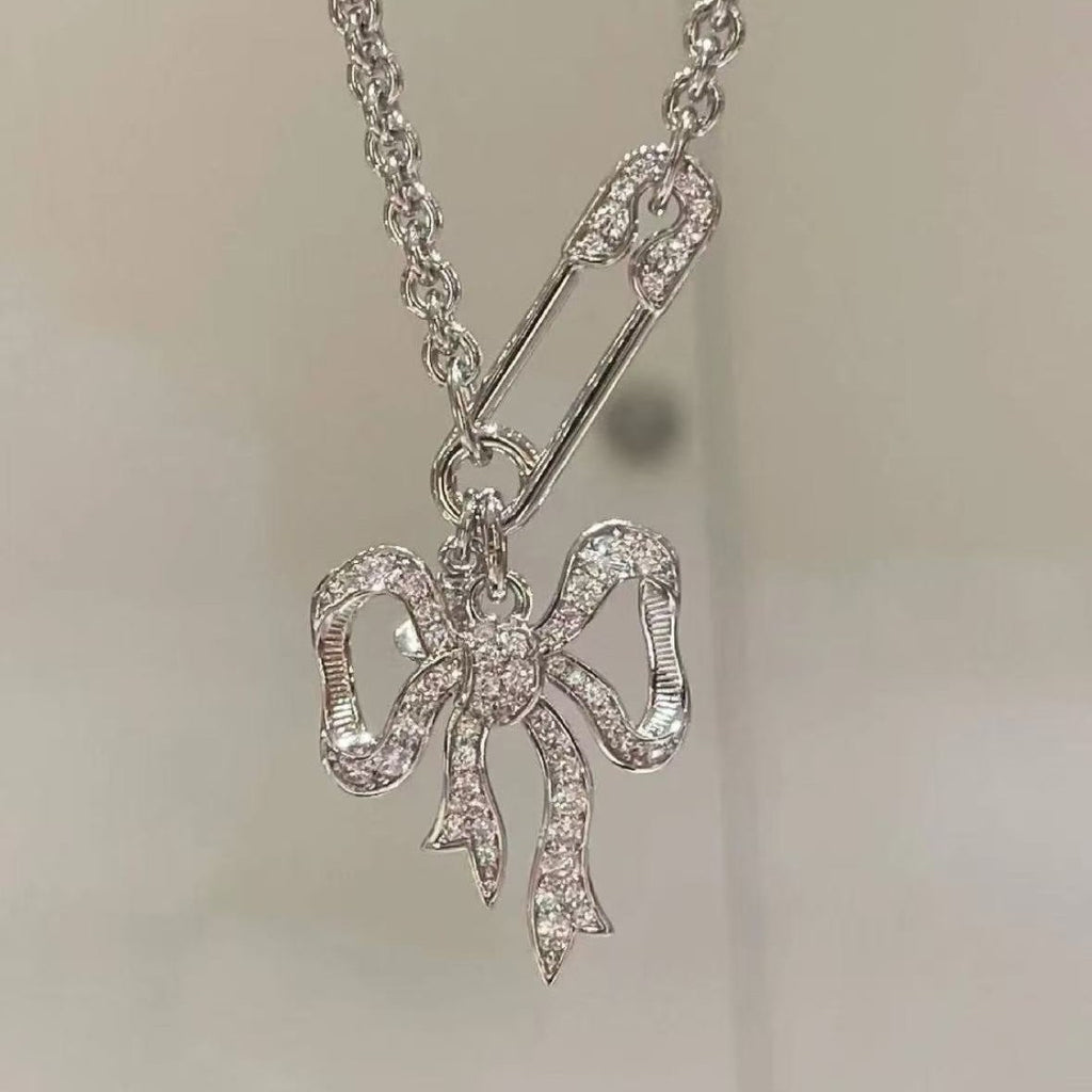 Bow chain necklace and earrings